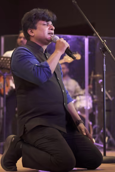 Worship team member serving during an ICPF Canada event